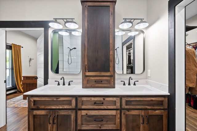 bathroom featuring hardwood / wood-style floors and vanity