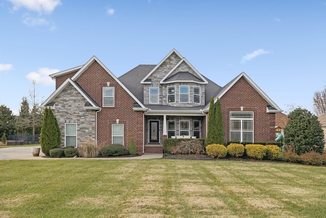 view of front of home featuring a front lawn