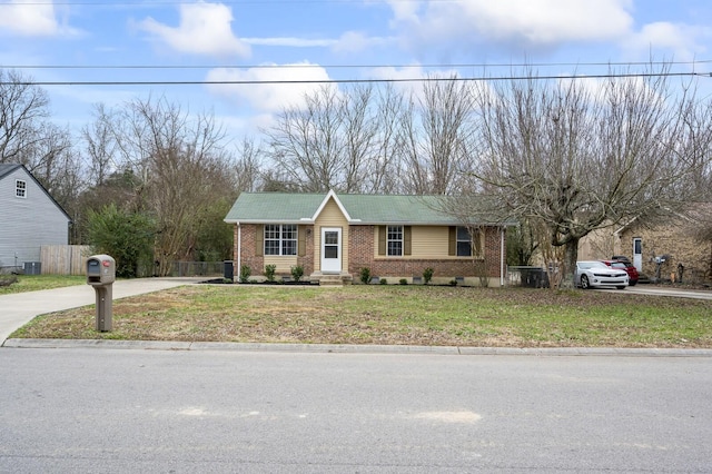 ranch-style house with a front yard