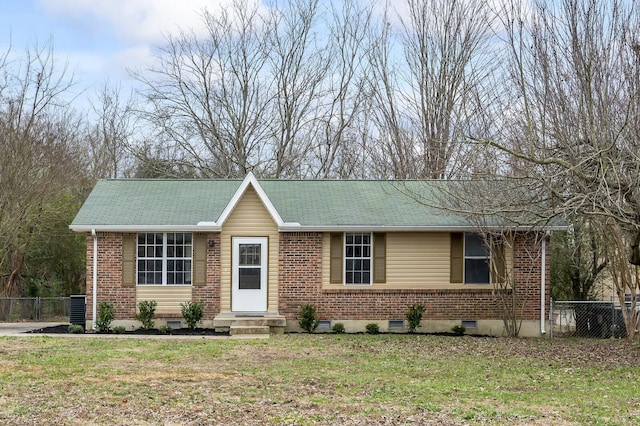 ranch-style home featuring a front yard