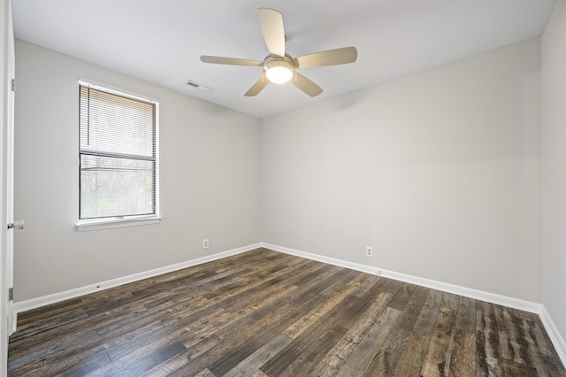 unfurnished room featuring dark hardwood / wood-style floors and ceiling fan