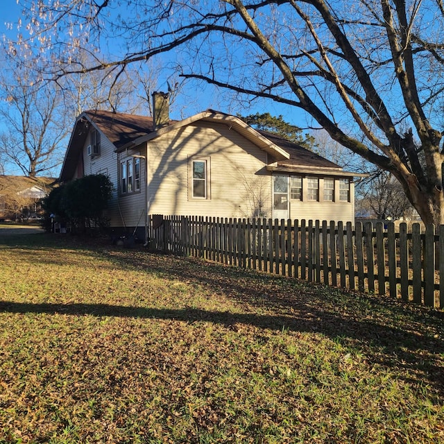 exterior space with a front yard