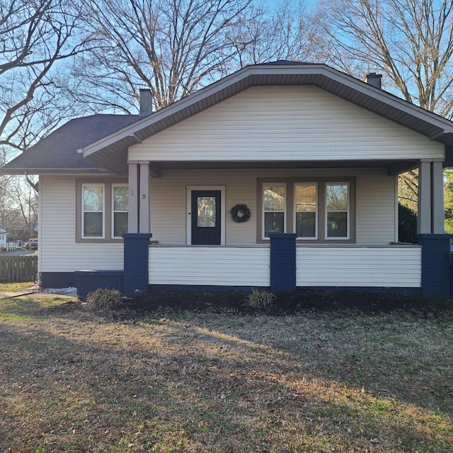 view of front of property featuring covered porch