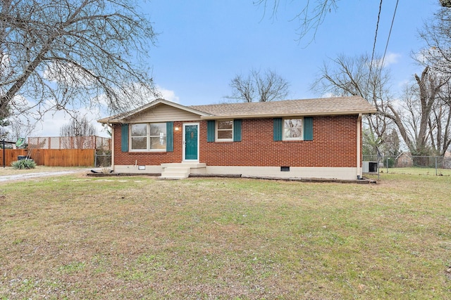 ranch-style house featuring a front lawn