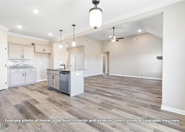 kitchen with light stone countertops, ceiling fan, a kitchen island with sink, dishwasher, and hanging light fixtures