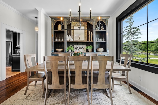 interior space featuring hardwood / wood-style flooring and ornamental molding