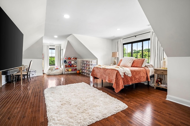 bedroom featuring vaulted ceiling and dark hardwood / wood-style floors