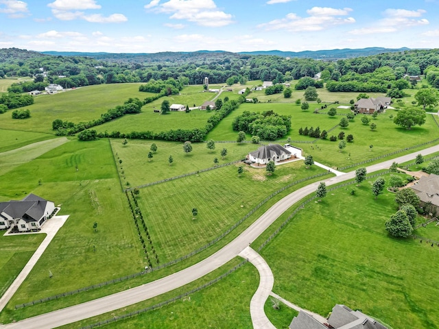 birds eye view of property featuring a rural view