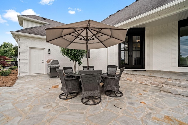 view of patio / terrace with grilling area and french doors