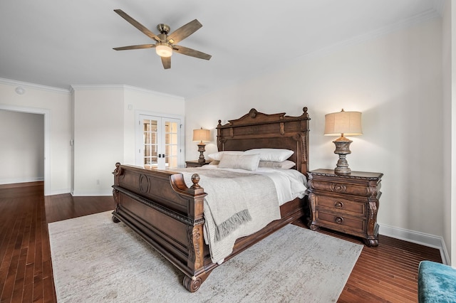 bedroom with french doors, dark hardwood / wood-style floors, ceiling fan, and ornamental molding