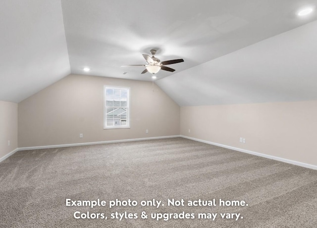 bonus room featuring ceiling fan, vaulted ceiling, and carpet