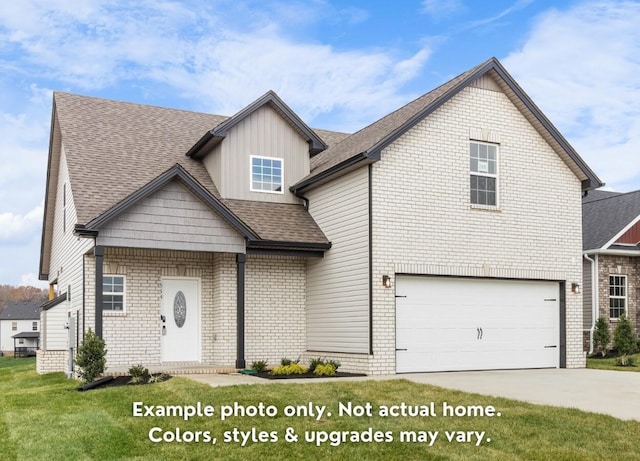 view of front of home featuring a garage and a front yard