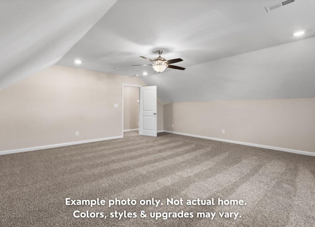 additional living space featuring vaulted ceiling, ceiling fan, and carpet floors