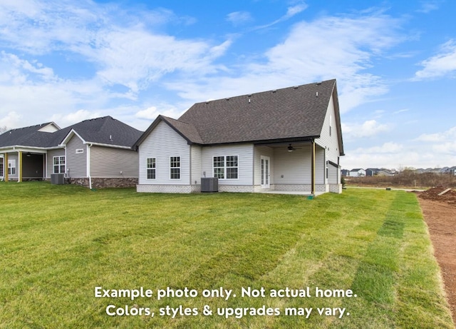 back of house with central AC, a patio area, and a lawn