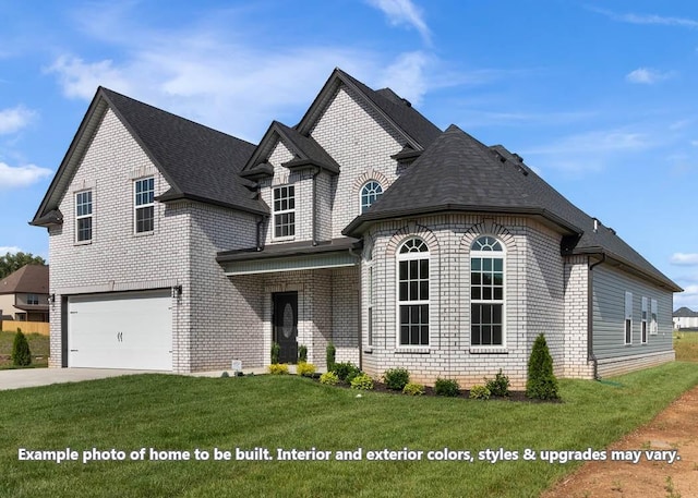 french country inspired facade featuring a garage and a front yard