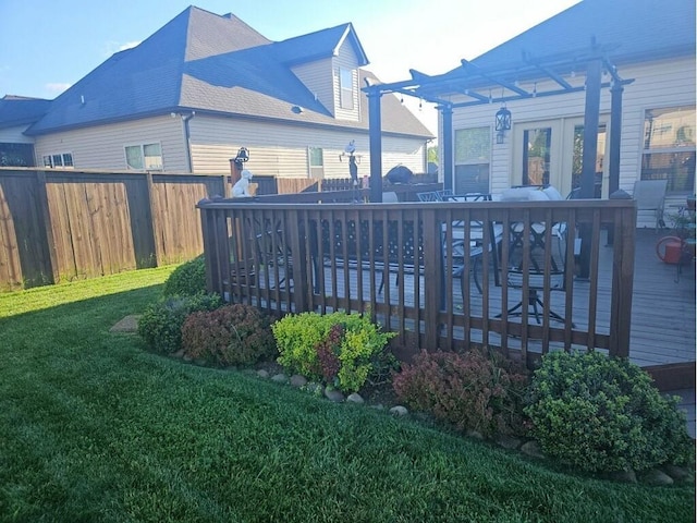 exterior space with a yard and a deck