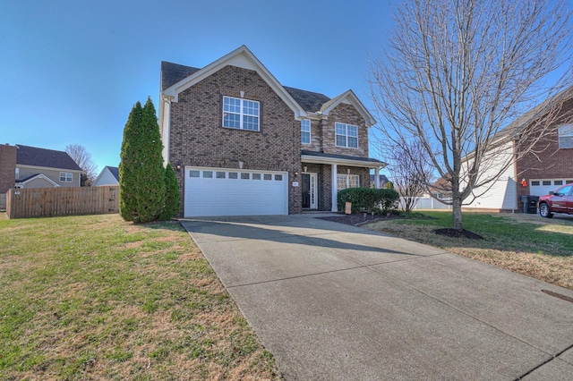 front facade featuring a garage and a front yard