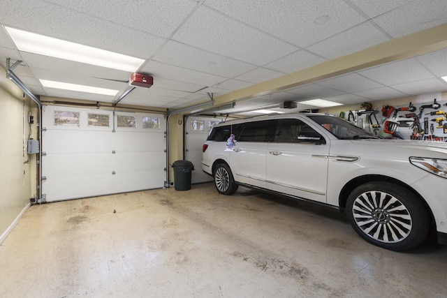 garage featuring a garage door opener