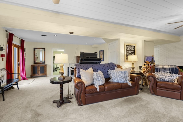 living room with ceiling fan and light carpet