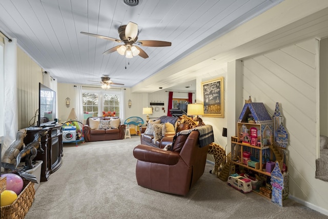 carpeted living room with ceiling fan and wooden ceiling