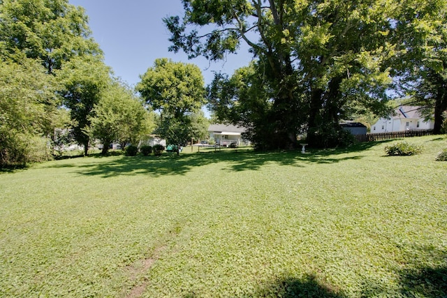 view of yard featuring fence