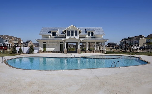 view of pool featuring a patio area