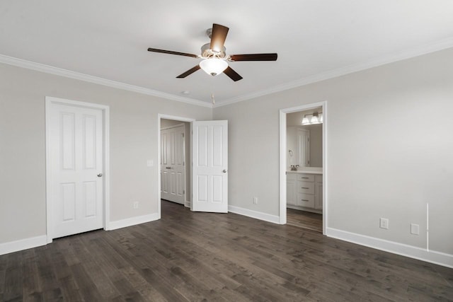 unfurnished bedroom featuring ceiling fan, dark hardwood / wood-style floors, ornamental molding, and ensuite bathroom