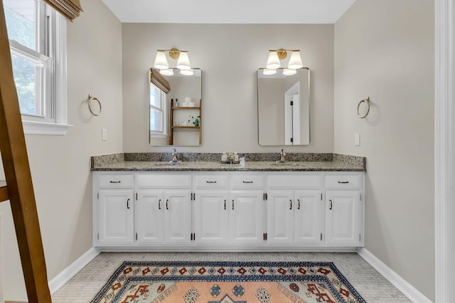 bathroom with vanity, tile patterned floors, and plenty of natural light