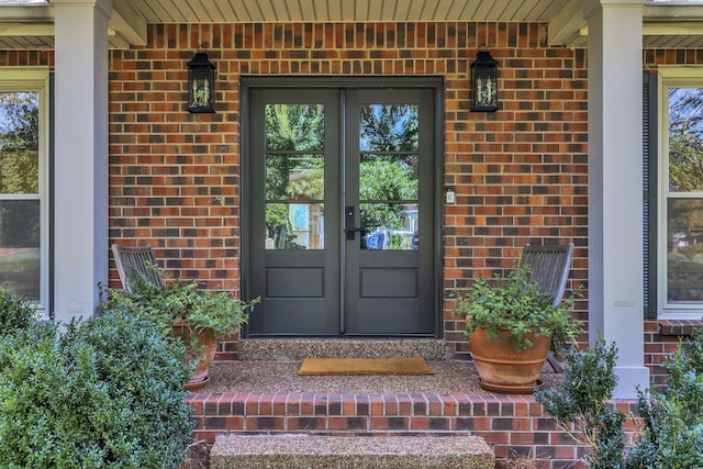 doorway to property featuring french doors and a porch