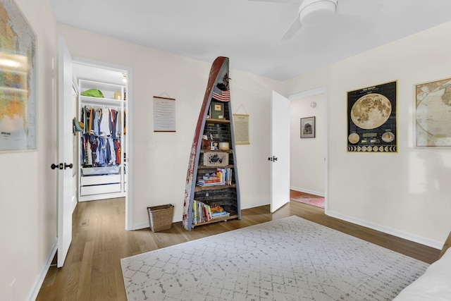 hallway with dark hardwood / wood-style flooring