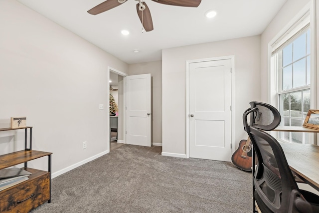 office featuring ceiling fan and carpet