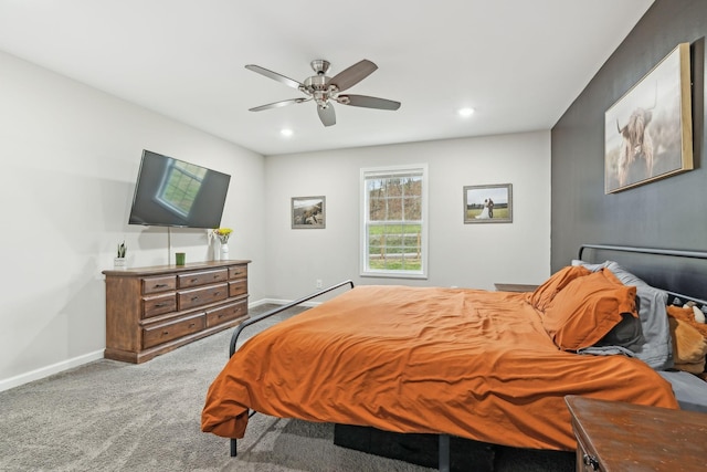 bedroom with light colored carpet and ceiling fan