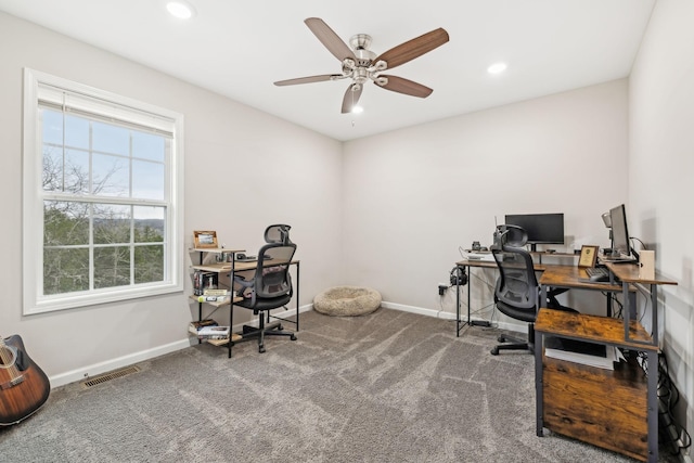 office space featuring carpet and ceiling fan