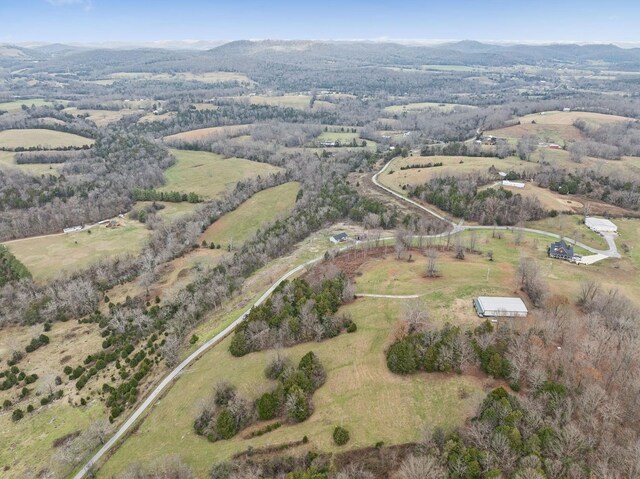 aerial view featuring a mountain view and a rural view