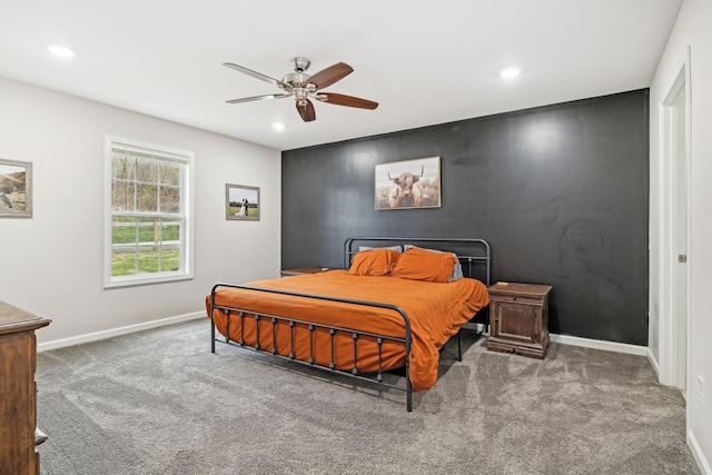 bedroom featuring ceiling fan and carpet floors