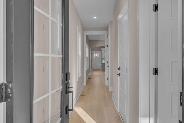 hallway featuring light hardwood / wood-style floors