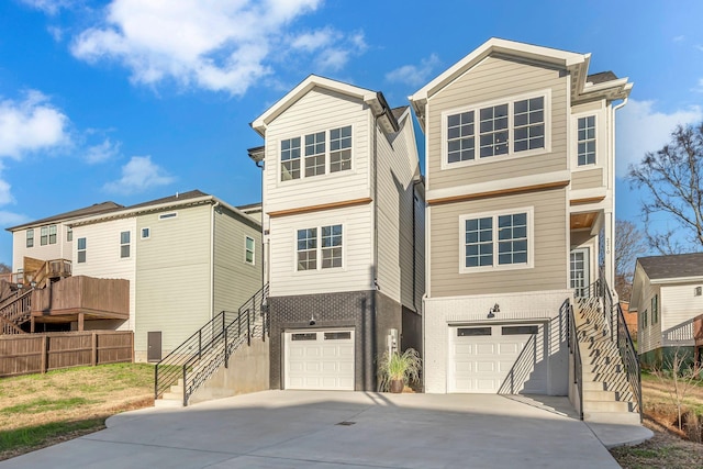 view of front of property featuring a garage