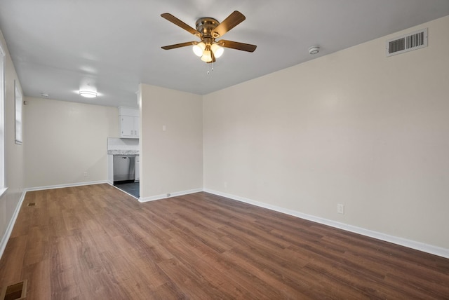 unfurnished living room featuring ceiling fan and hardwood / wood-style flooring