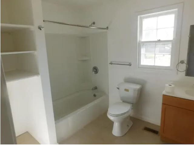 full bathroom with vanity, toilet, and tub / shower combination