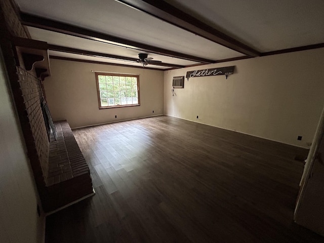 interior space featuring a wall mounted air conditioner, a fireplace, ceiling fan, beamed ceiling, and dark hardwood / wood-style floors