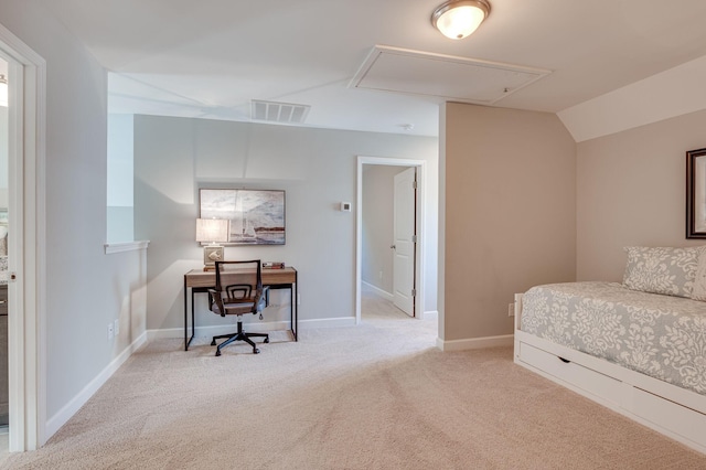 bedroom with light carpet and vaulted ceiling