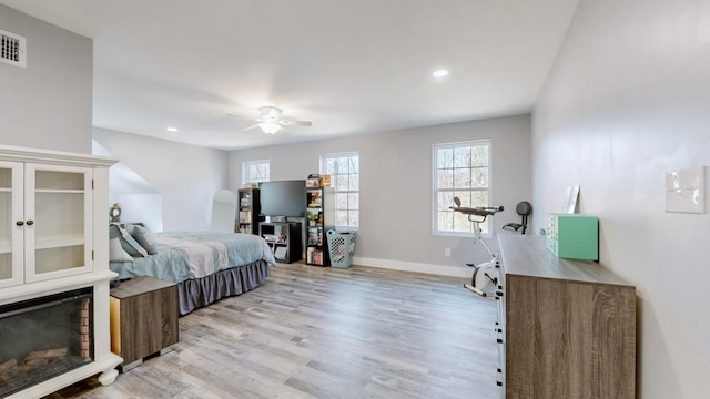 bedroom featuring ceiling fan and light wood-type flooring