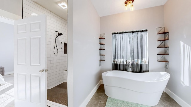 bathroom featuring tile patterned floors and independent shower and bath