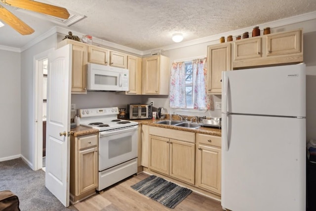 kitchen featuring white appliances, crown molding, sink, a textured ceiling, and light brown cabinetry