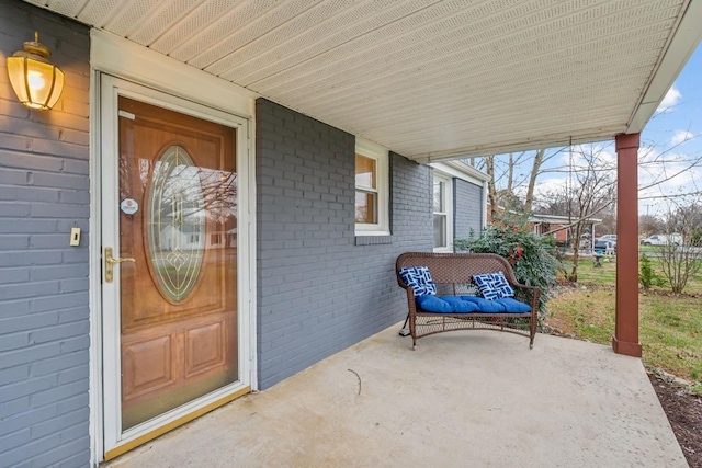 entrance to property with a patio