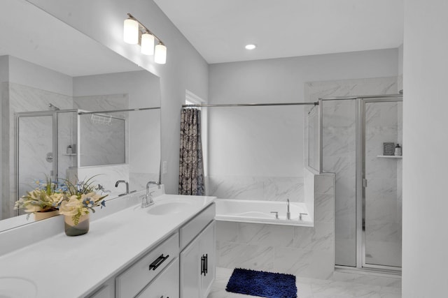 bathroom with separate shower and tub and vanity