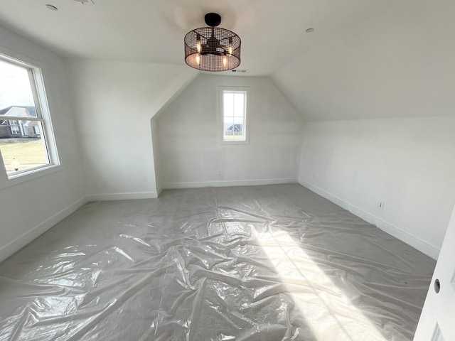 bonus room featuring lofted ceiling