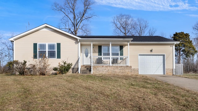 ranch-style home featuring covered porch, a garage, and a front lawn