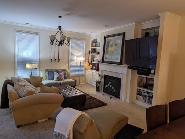 carpeted living room with an inviting chandelier, ornamental molding, and a tiled fireplace