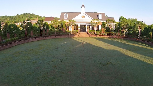 view of front of house with a front lawn